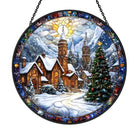 Eine Stadt im Schnee zu Weihnachten Fenster-hängender Sonnenfänger