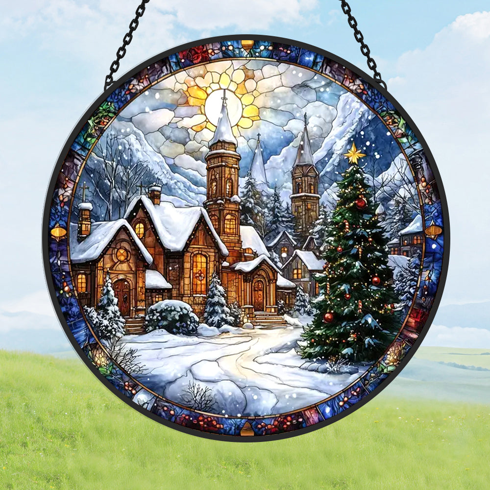 Eine Stadt im Schnee zu Weihnachten Fenster-hängender Sonnenfänger