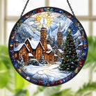 Eine Stadt im Schnee zu Weihnachten Fenster-hängender Sonnenfänger